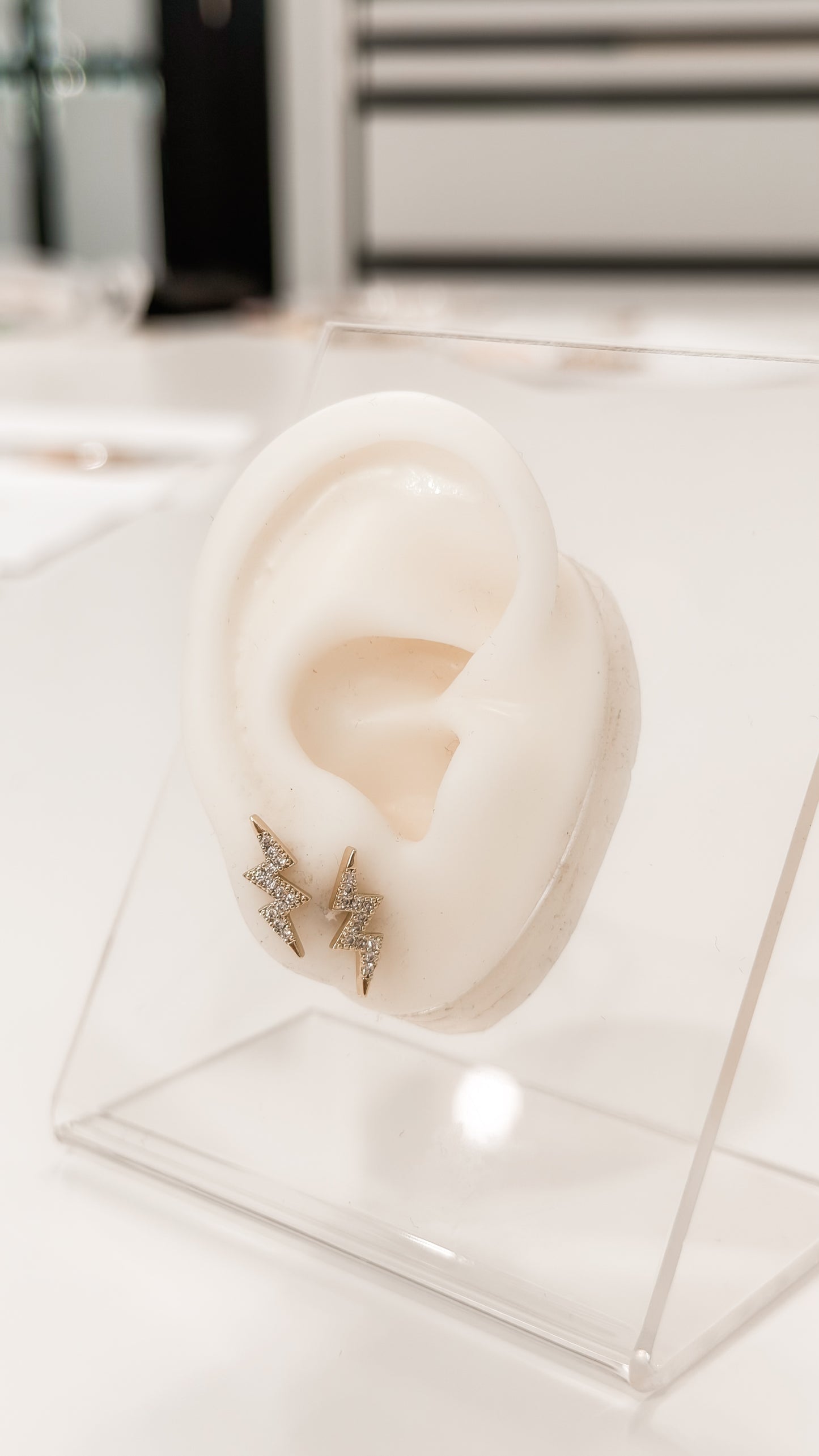 ARETES RAYITOS