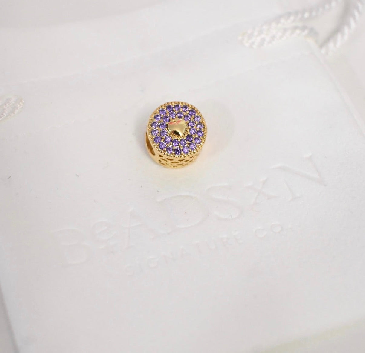 THE ROUND HEART CHARM